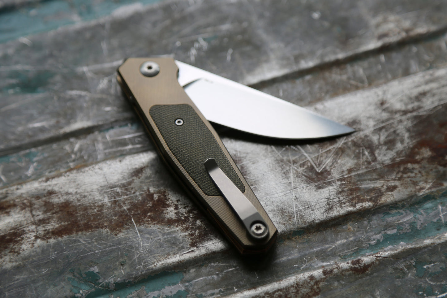 TOKO - Titanium Amber with Inlays - deposit